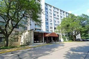 a view of a building with a street
