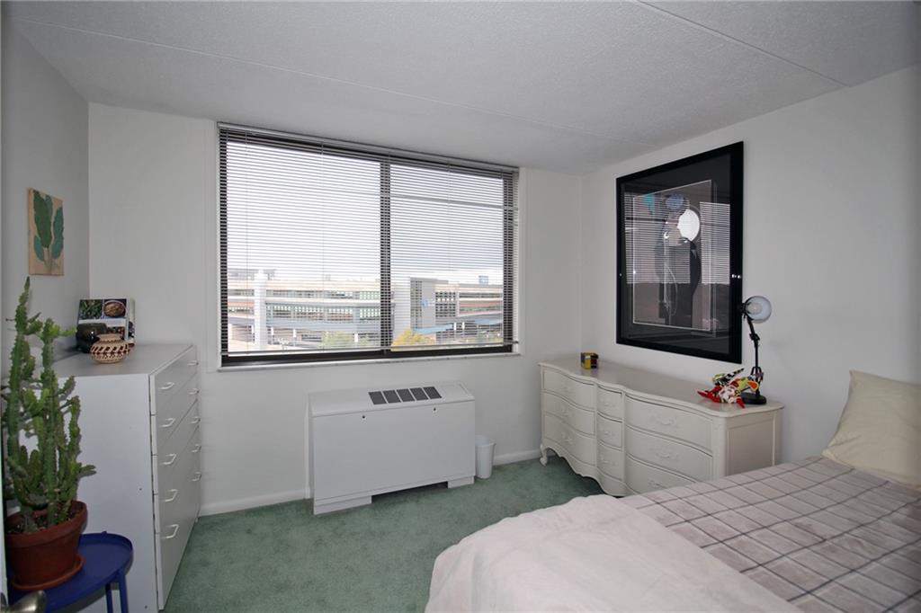 1160 Bower Hill Road, Unit 1101B Pittsburgh, PA 15243 - Photo 20 of 33 a bedroom with a bed and a window