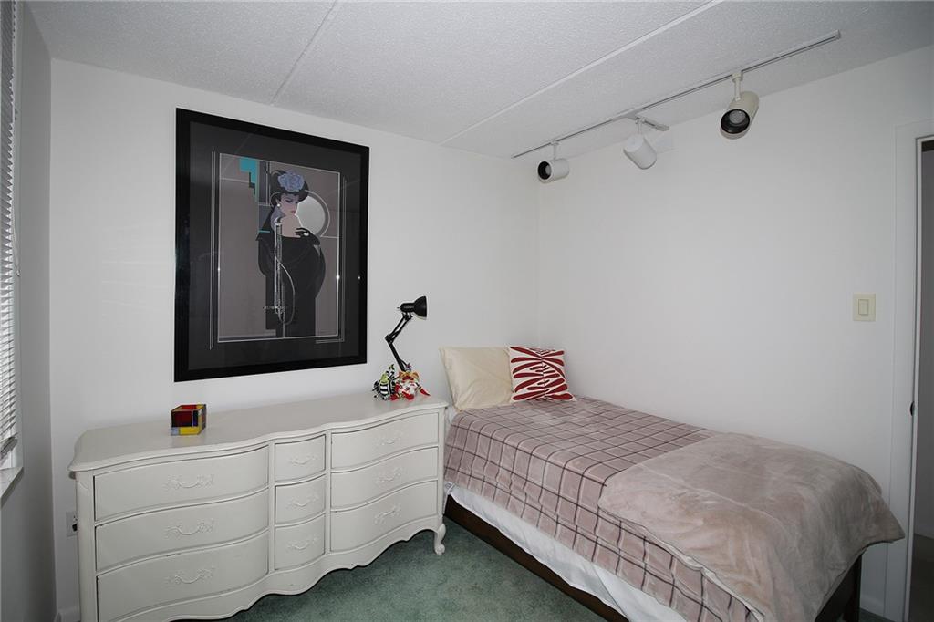 1160 Bower Hill Road, Unit 1101B Pittsburgh, PA 15243 - Photo 21 of 33 a bedroom with a bed and a window