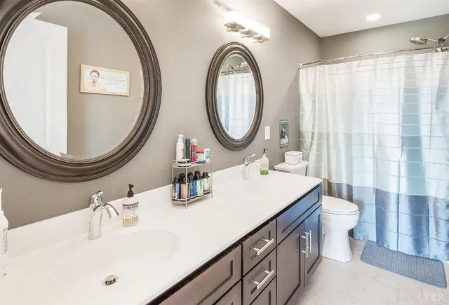 a view of a livingroom with furniture and a flat screen tv