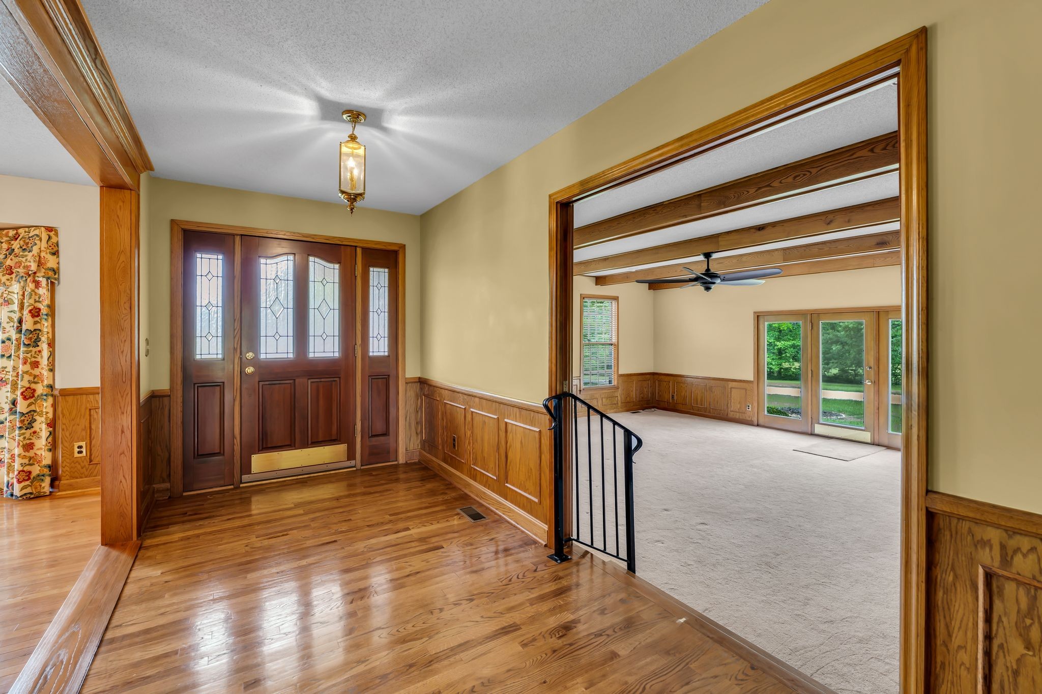 28 Ok Road Lawrenceburg, TN 38464 - Photo 17 of 76 a view of a hallway with wooden floor and windows