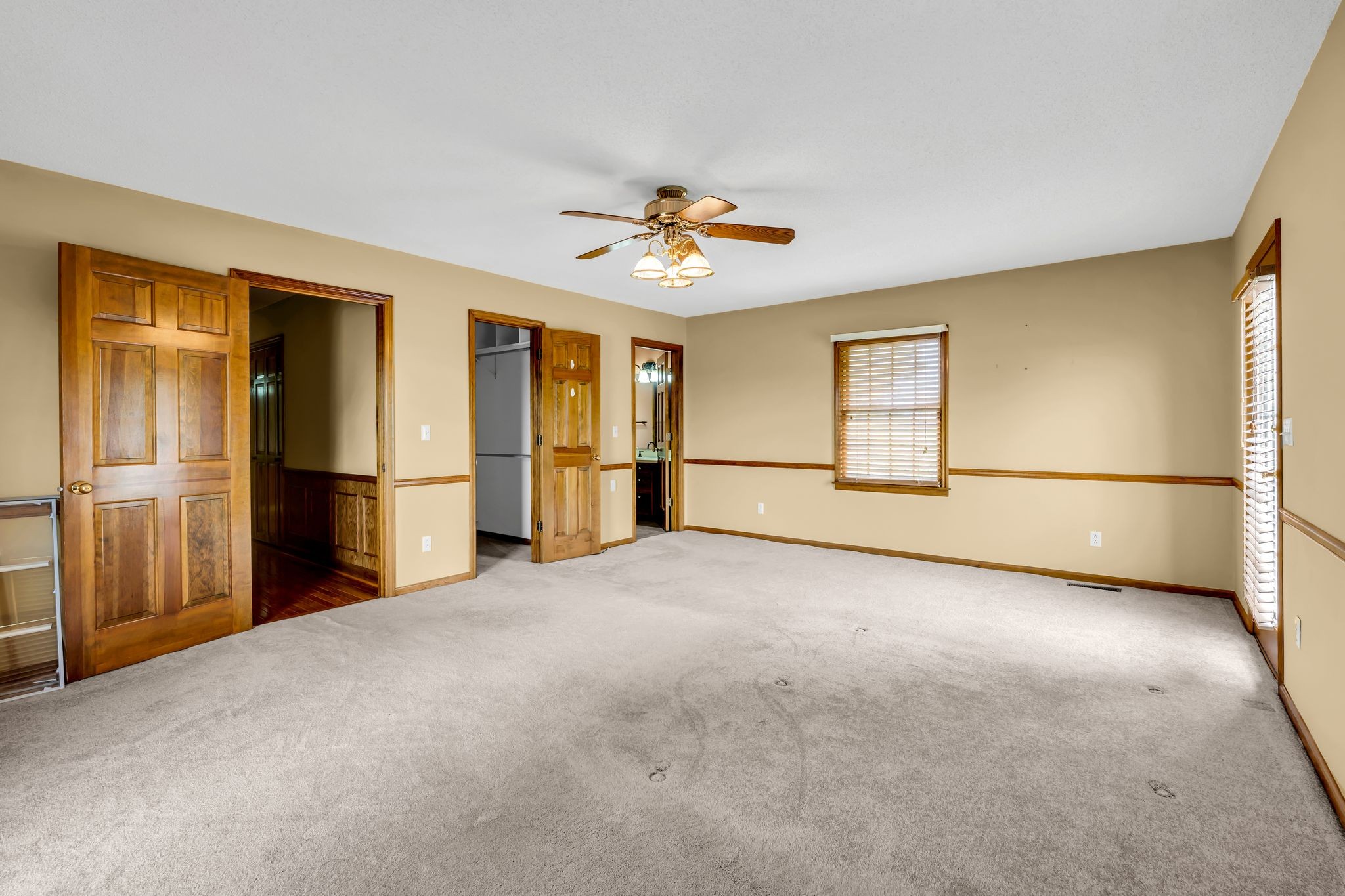 28 Ok Road Lawrenceburg, TN 38464 - Photo 40 of 76 a view of empty room with windows and ceiling fan