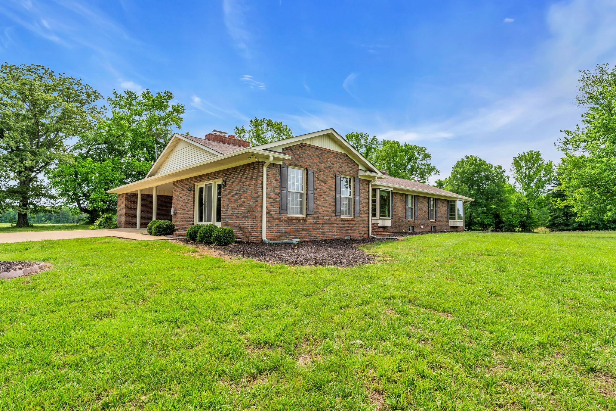 28 Ok Road Lawrenceburg, TN 38464 - Photo 69 of 76 a front view of a house with yard and green space
