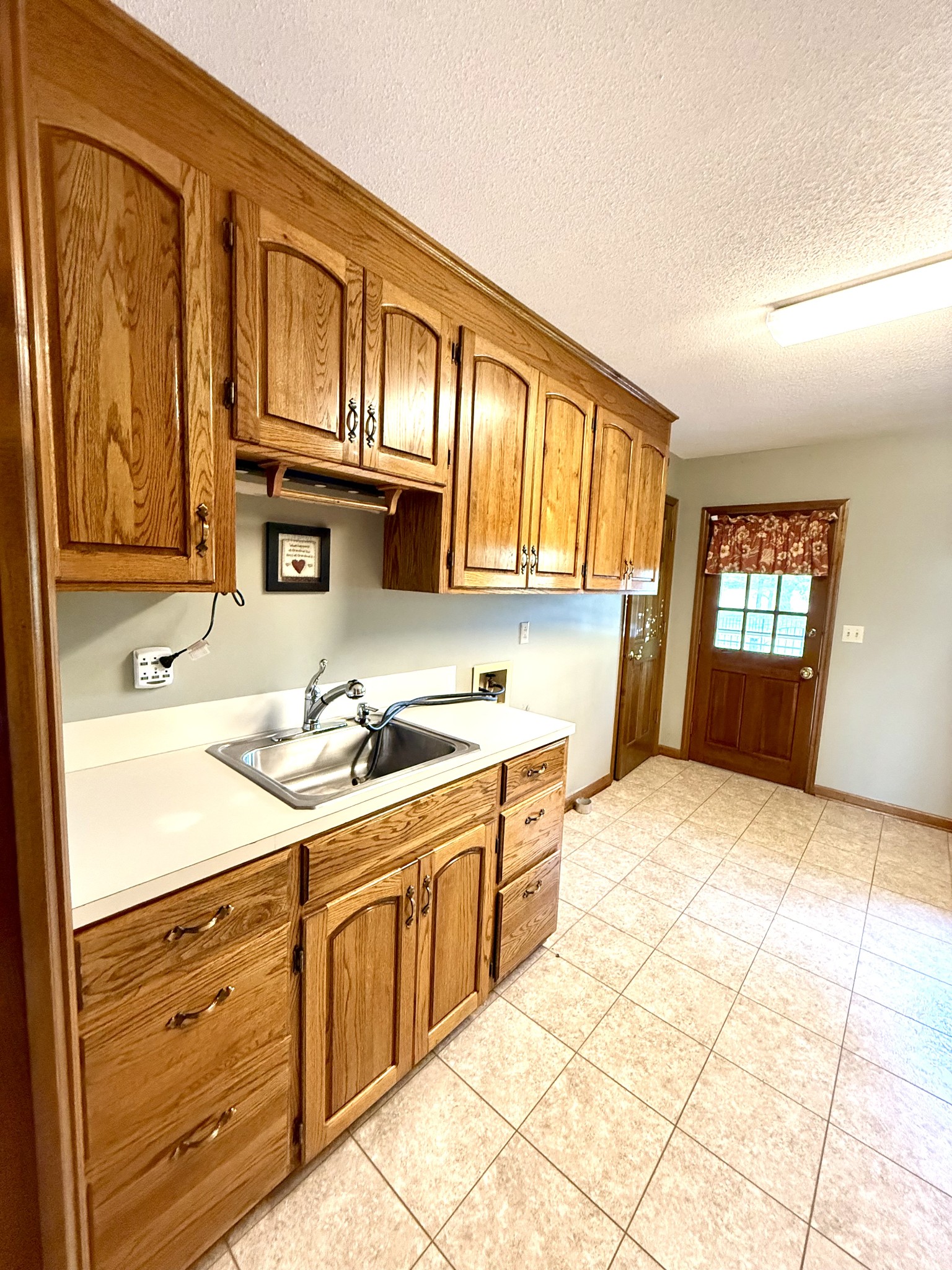 28 Ok Road Lawrenceburg, TN 38464 - Photo 7 of 76 a kitchen with stainless steel appliances granite countertop a sink dishwasher stove and cabinets