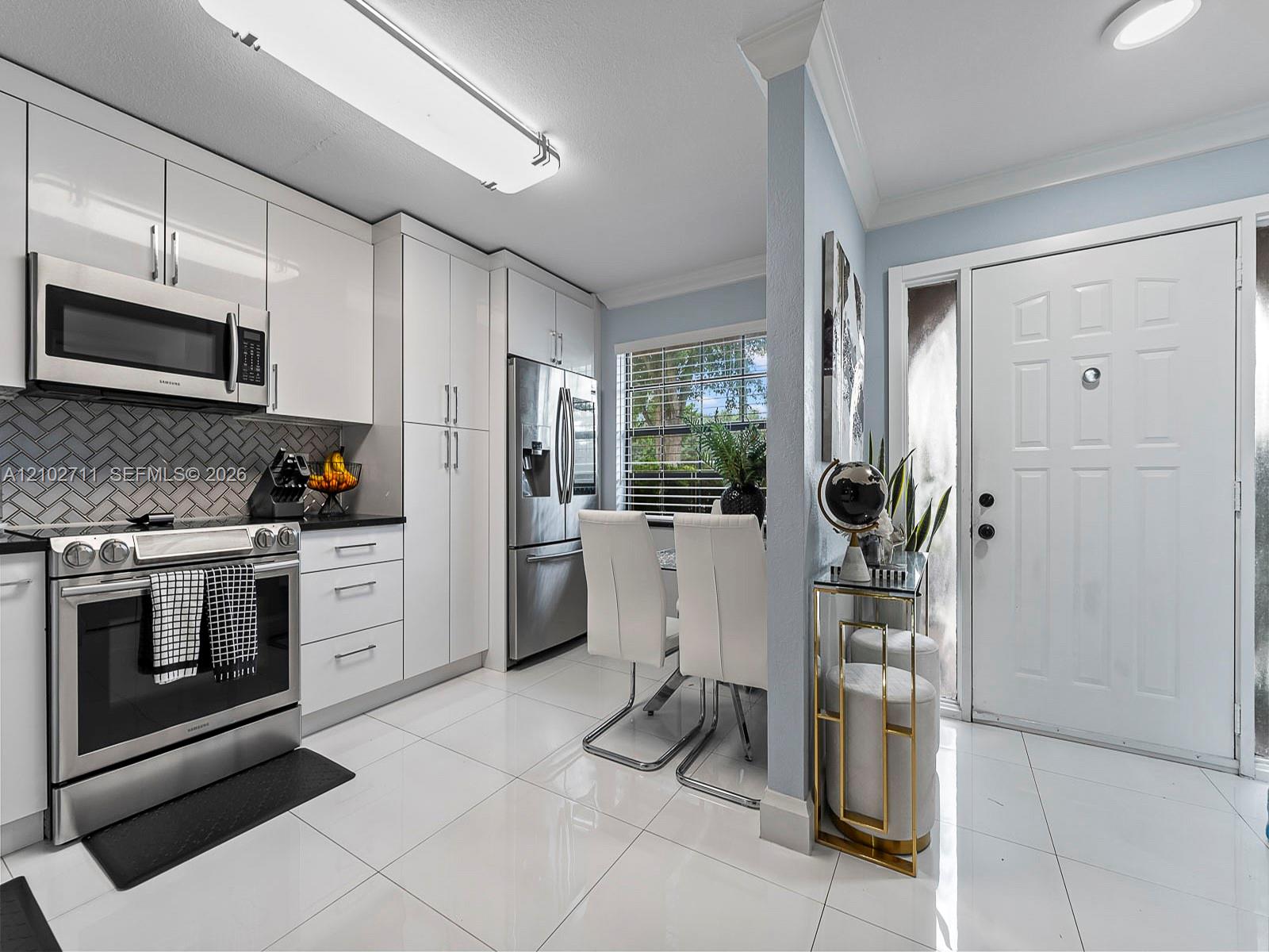 10942 West Sample Road Coral Springs, FL 33065 - Photo 10 of 32 Gallery Image 10