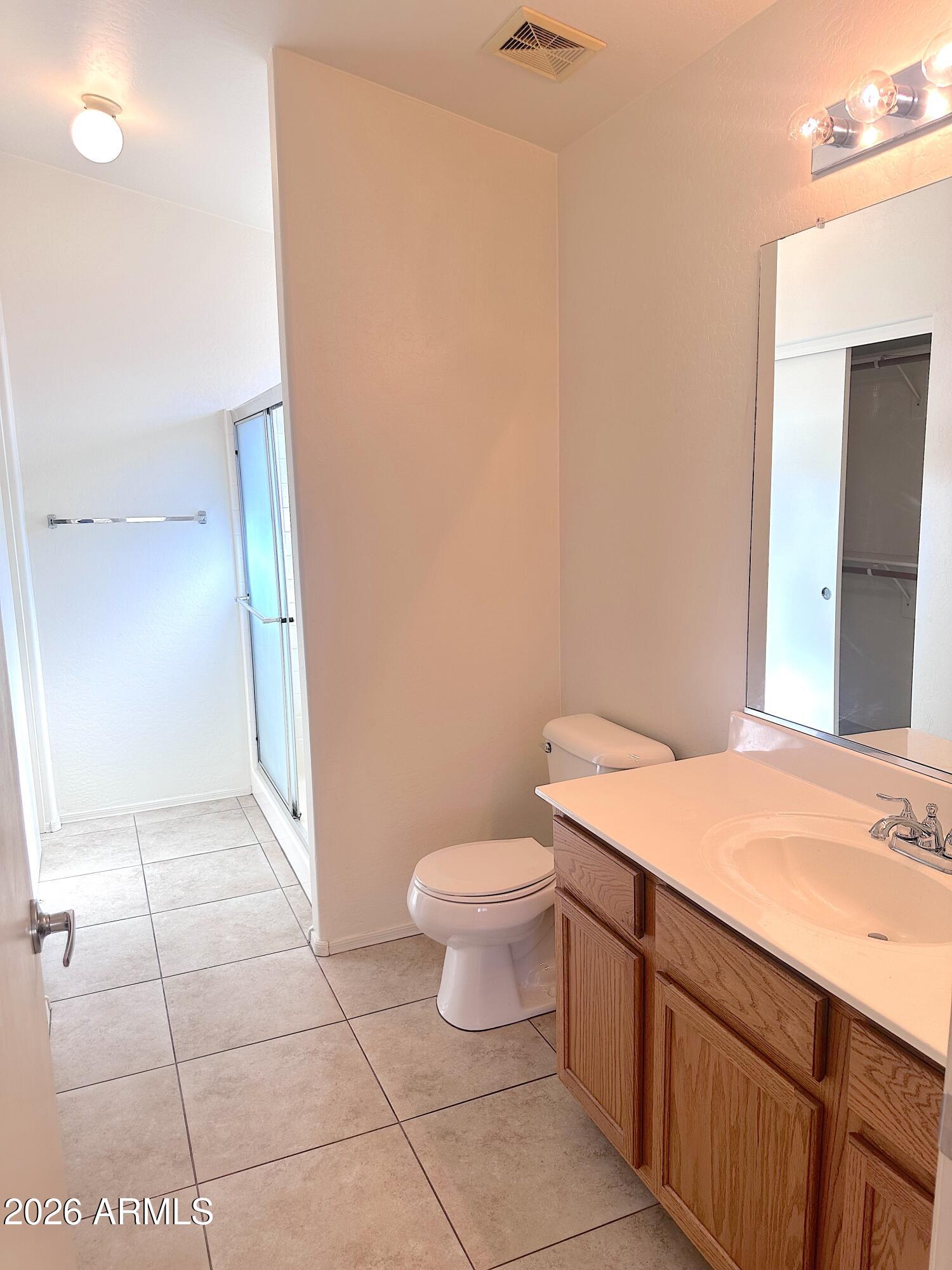 4106 East Chambers Street Phoenix, AZ 85040 - Photo 17 of 33 a bathroom with a sink and a toilet