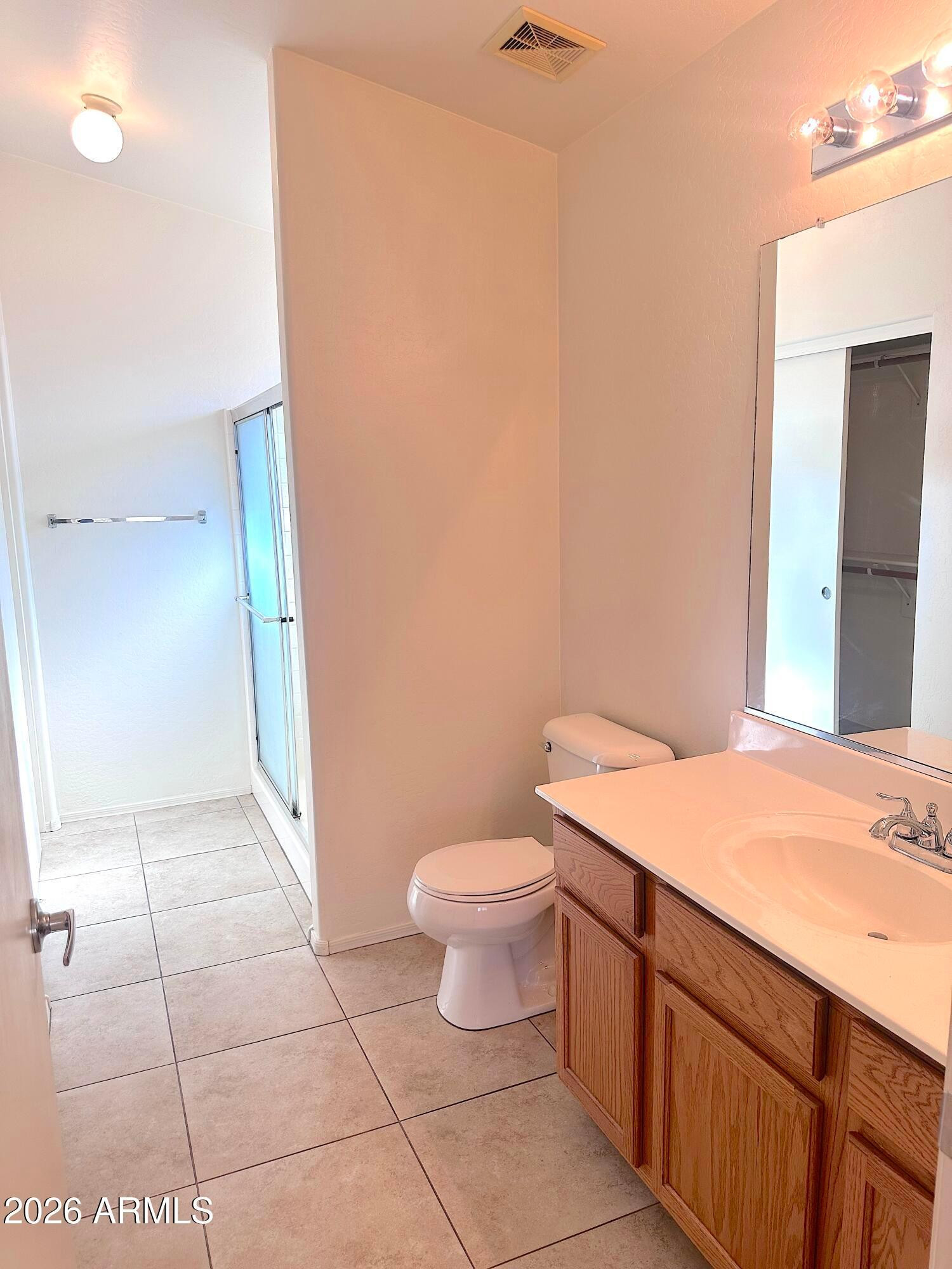 4106 East Chambers Street Phoenix, AZ 85040 - Photo 17 of 33 a bathroom with a sink and a toilet