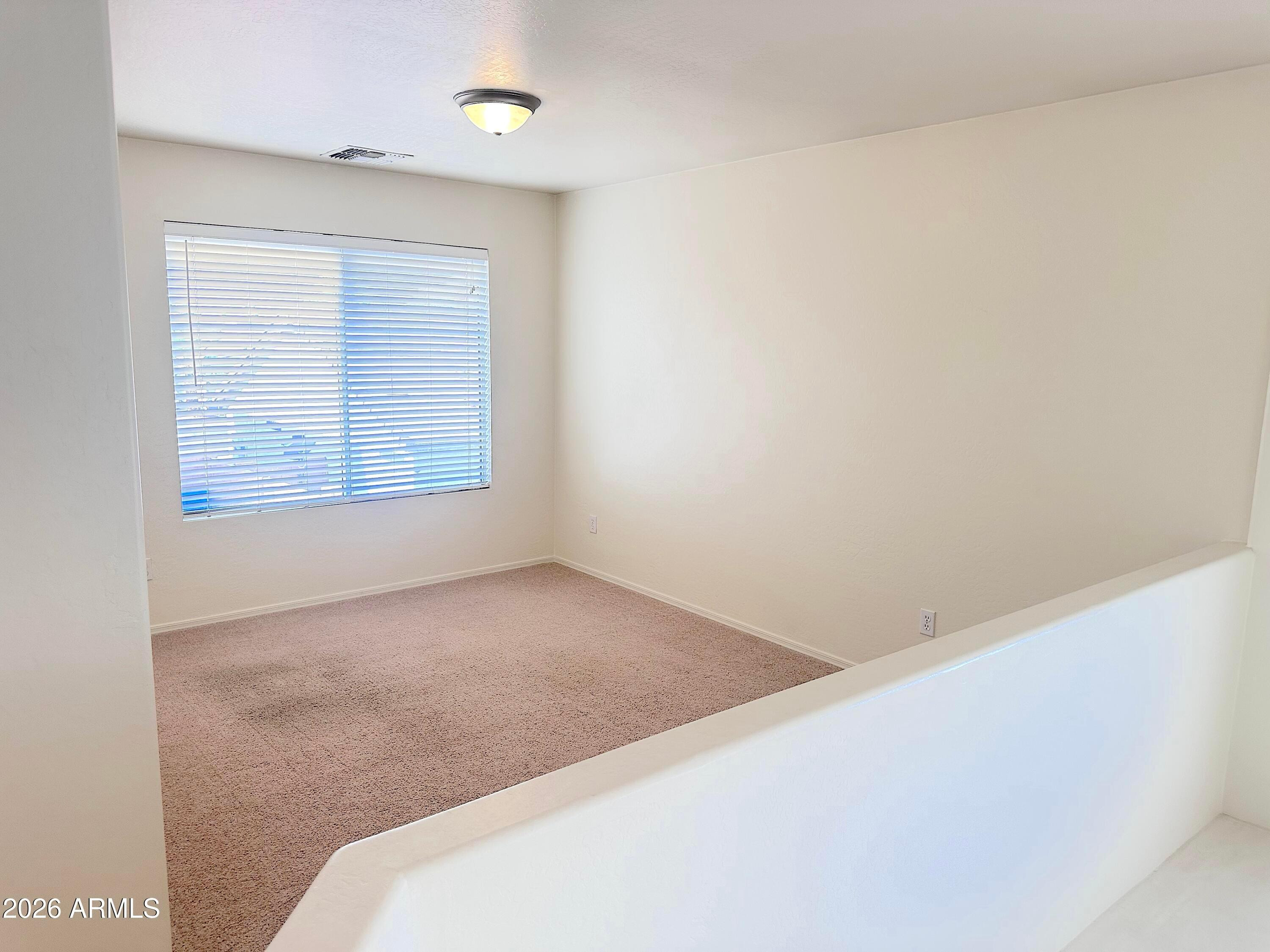 4106 East Chambers Street Phoenix, AZ 85040 - Photo 19 of 33 a view of a room that has a window in it
