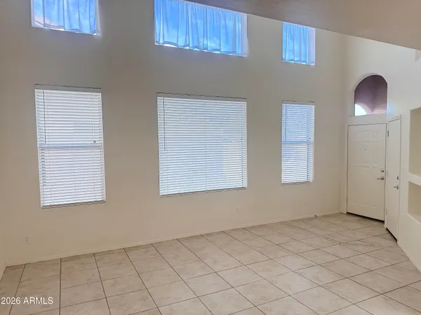 an empty room with windows