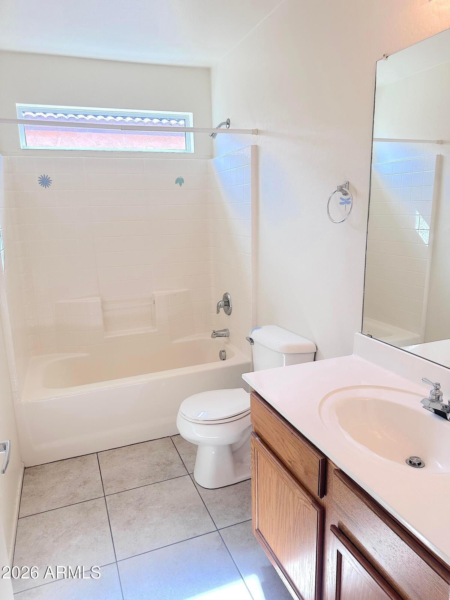 4106 East Chambers Street Phoenix, AZ 85040 - Photo 24 of 33 a bathroom with a sink a toilet and bathtub