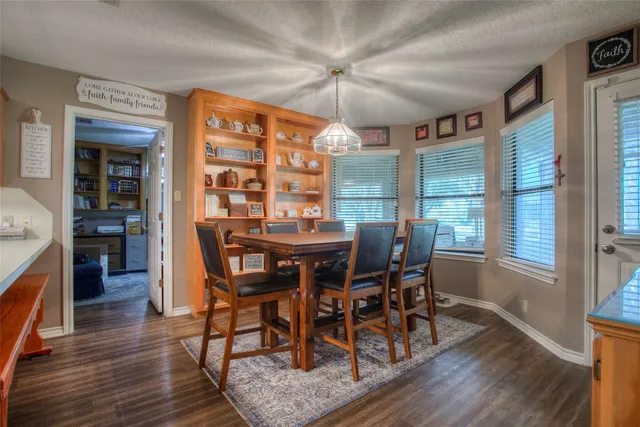 a view of a workspace with furniture and toys