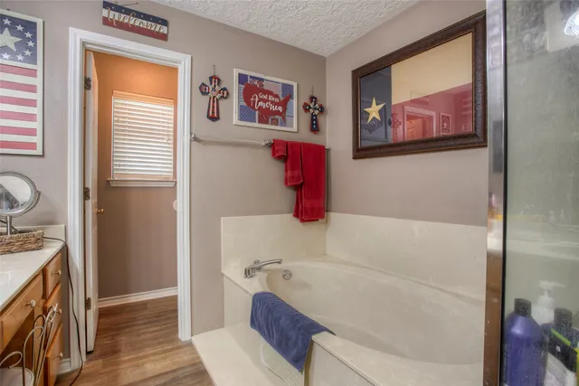 a living room filled with furniture and a large window
