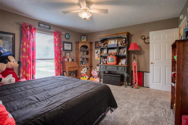 a kitchen with a refrigerator and a sink