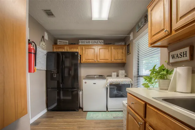 a view of grassy field with trees