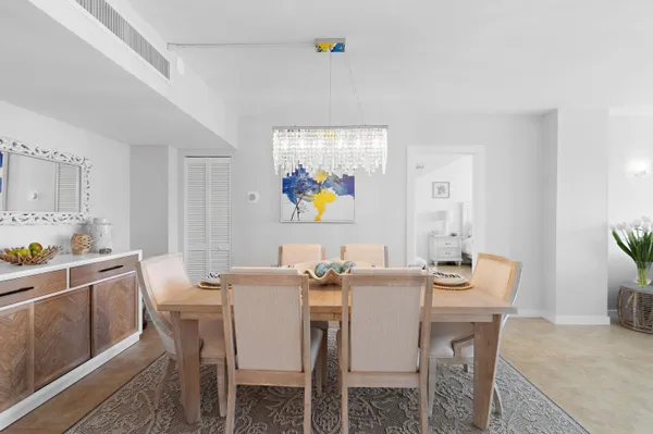 a view of a dining room with furniture