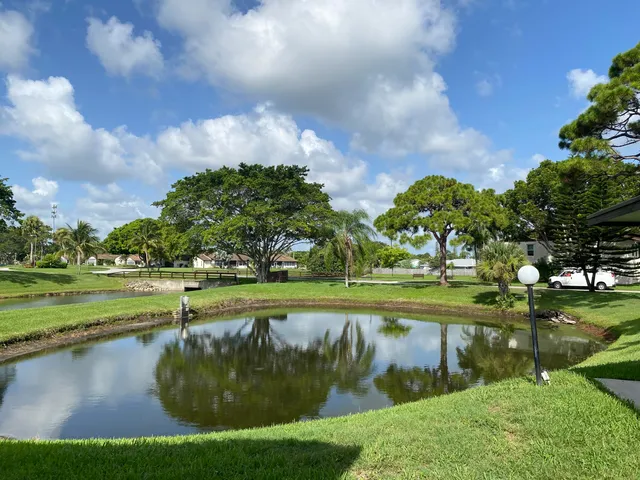 a view of a lake with a big yard