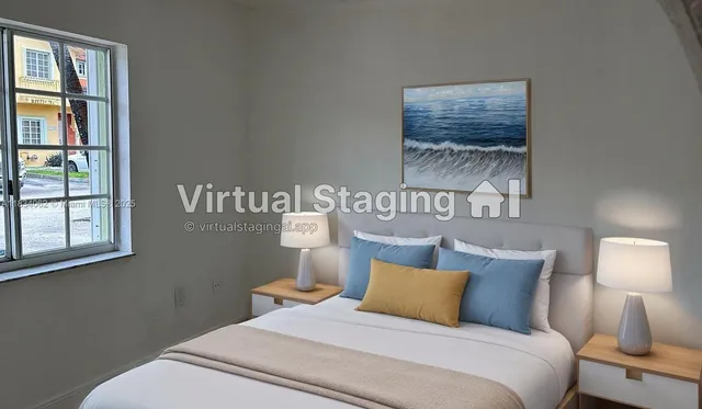 a bedroom with a bed and night stand