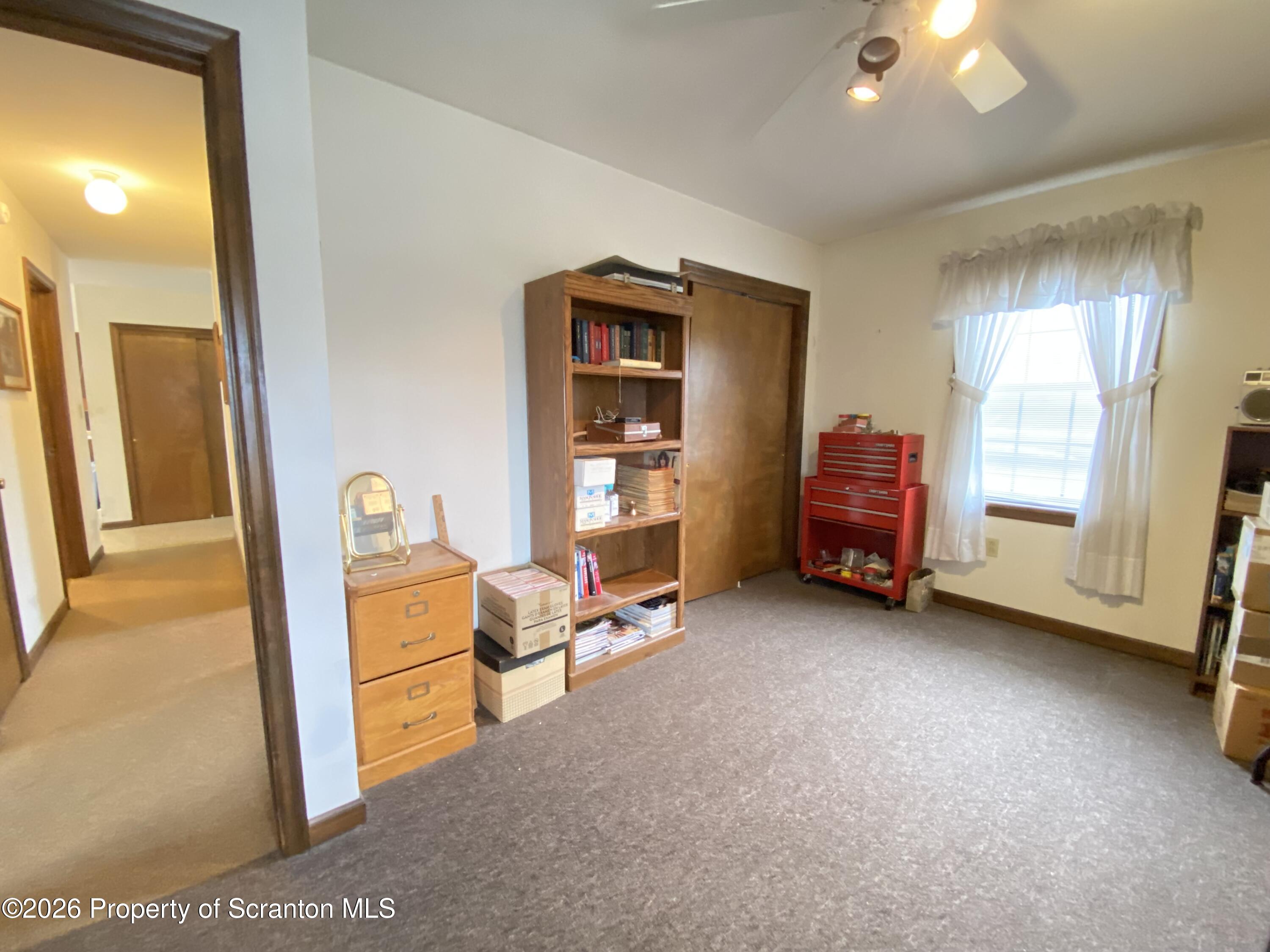 1303 Ridgewood Avenue Scranton, PA 18505 - Photo 22 of 57 a view of room with window and couch
