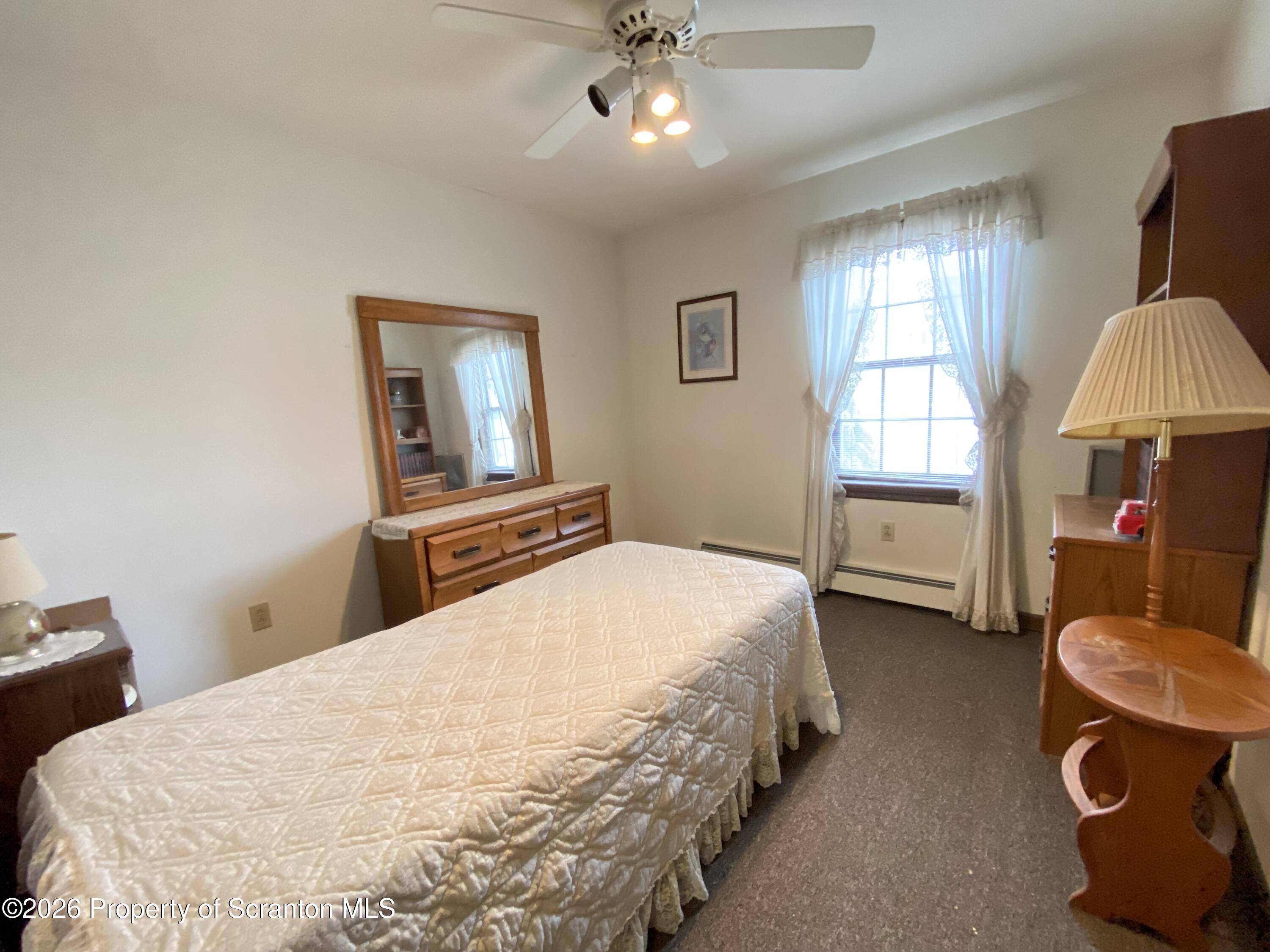 1303 Ridgewood Avenue Scranton, PA 18505 - Photo 23 of 57 a bedroom with a bed and window