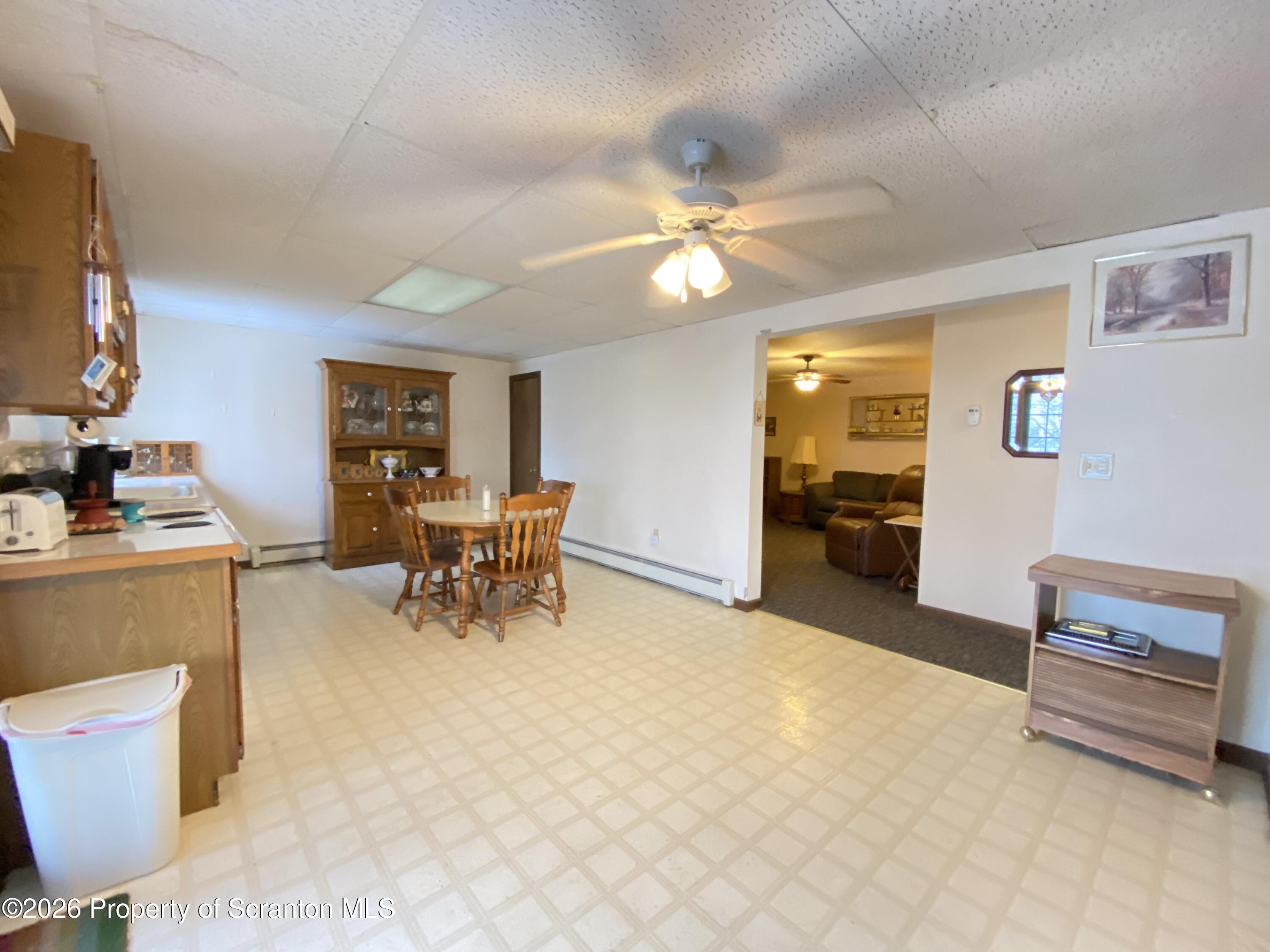 1303 Ridgewood Avenue Scranton, PA 18505 - Photo 31 of 57 a living room with furniture and a flat screen tv