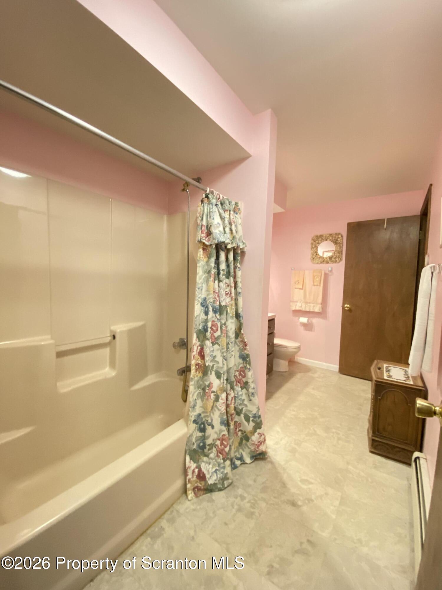 1303 Ridgewood Avenue Scranton, PA 18505 - Photo 32 of 57 a bathroom with a bathtub and a shower