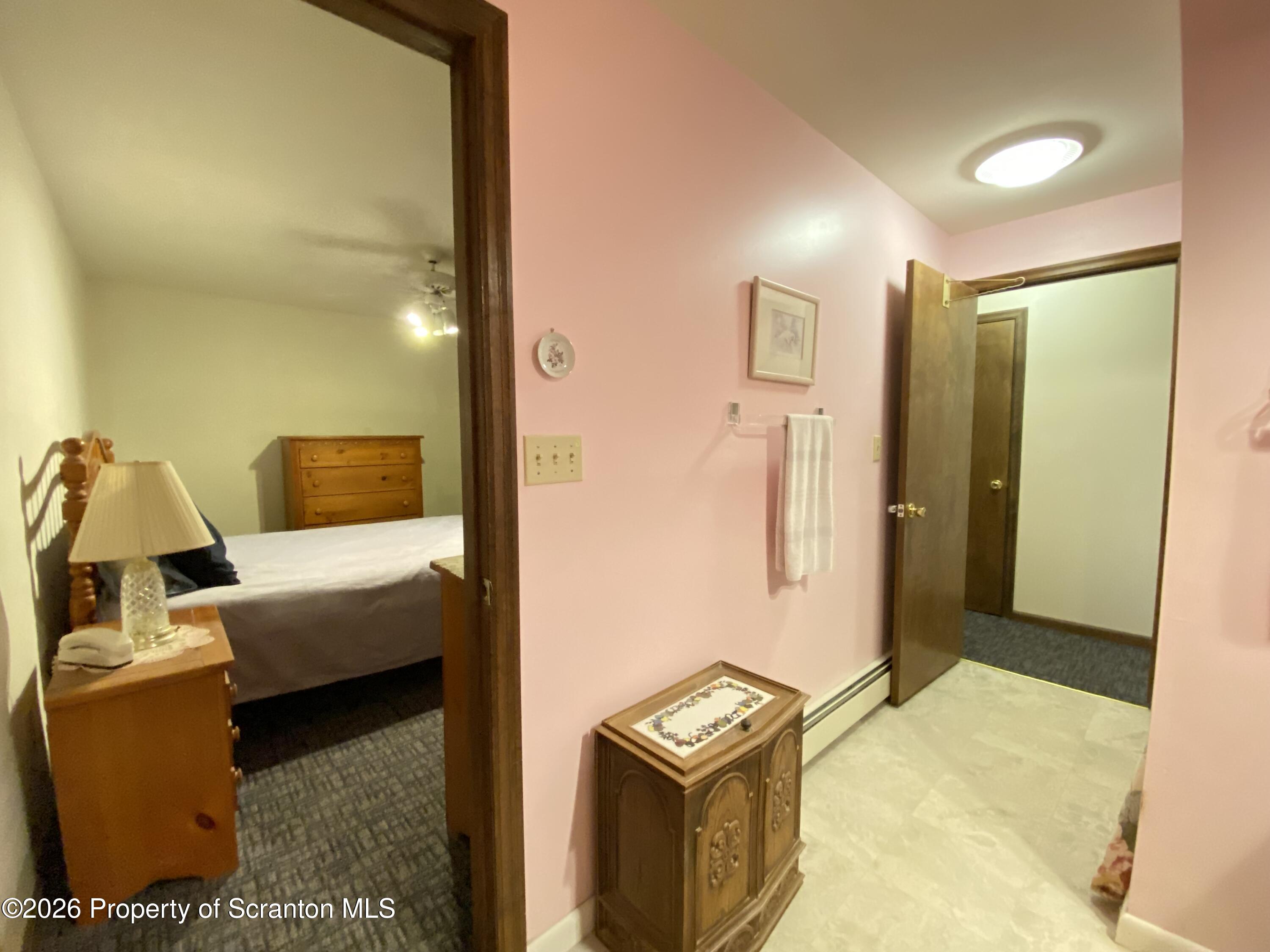 1303 Ridgewood Avenue Scranton, PA 18505 - Photo 34 of 57 a living room with a couch and a table