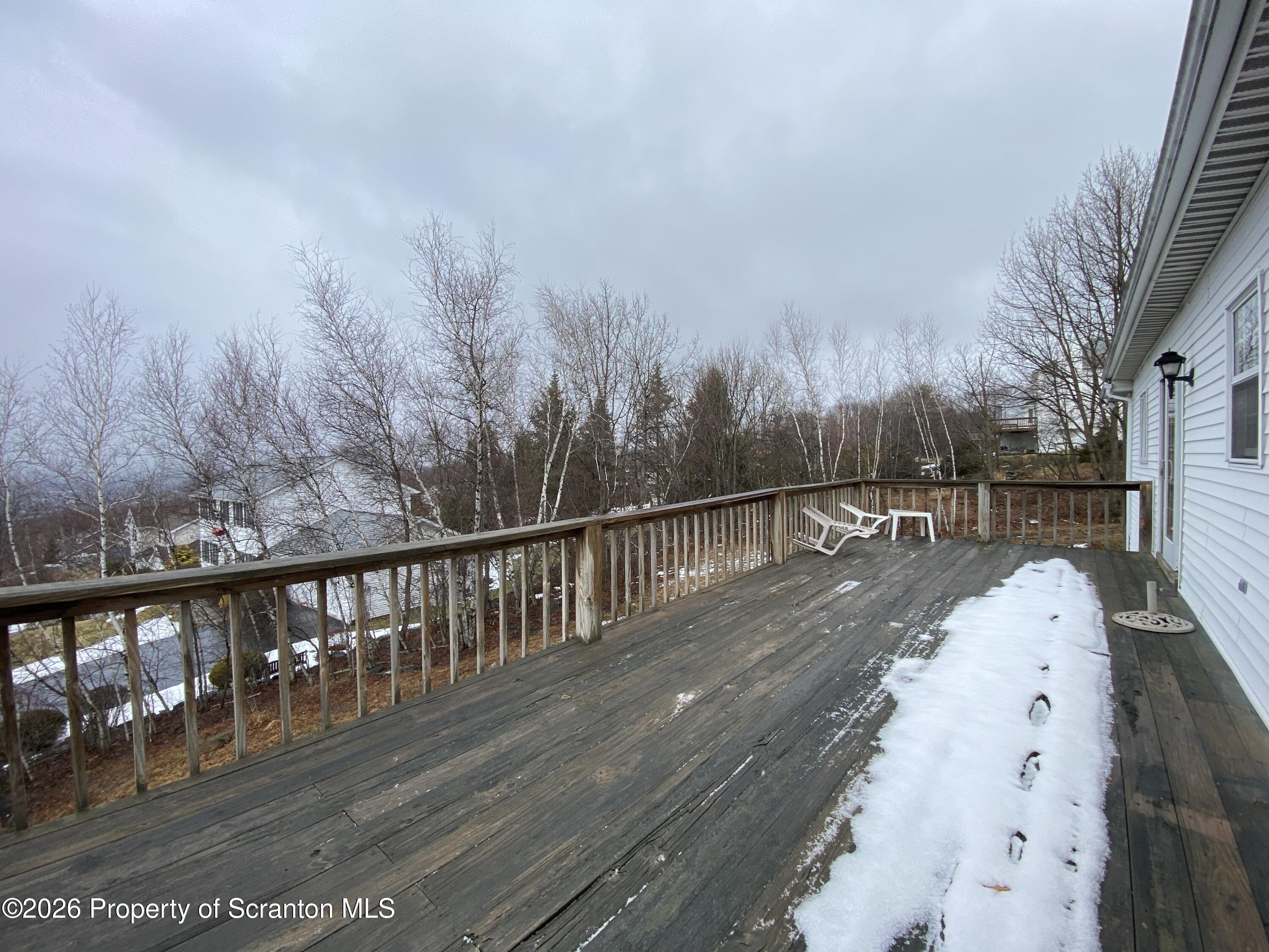 1303 Ridgewood Avenue Scranton, PA 18505 - Photo 48 of 57 a view of a balcony with trees