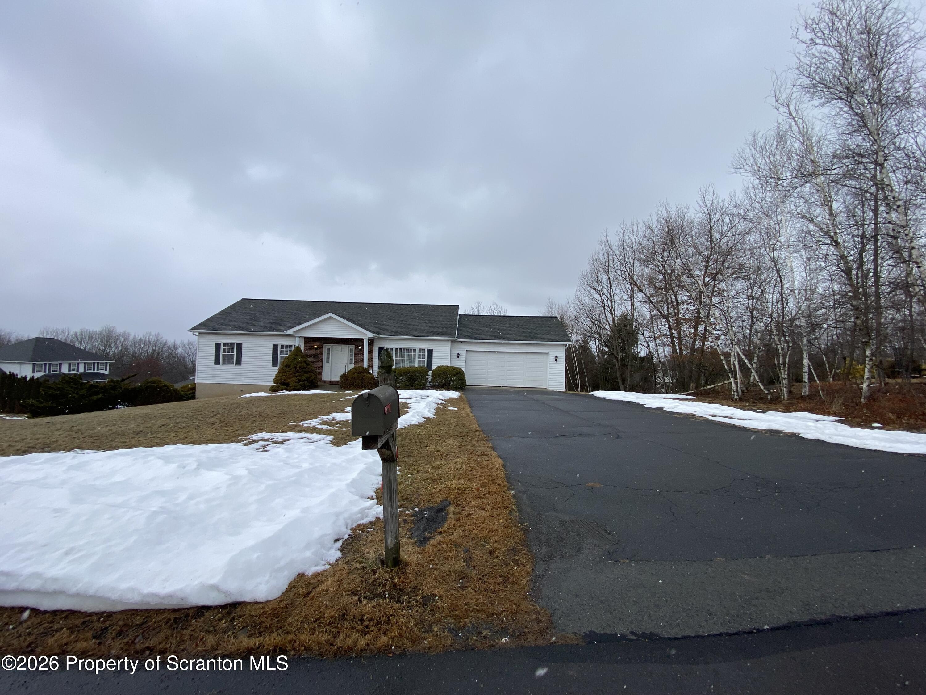 1303 Ridgewood Avenue Scranton, PA 18505 - Photo 57 of 57 a front view of a house with yard