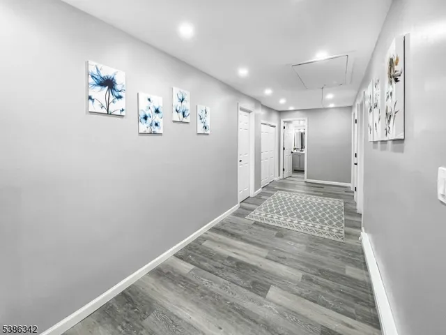 a view of livingroom with painting on the wall