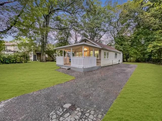 a house with garden in front of it