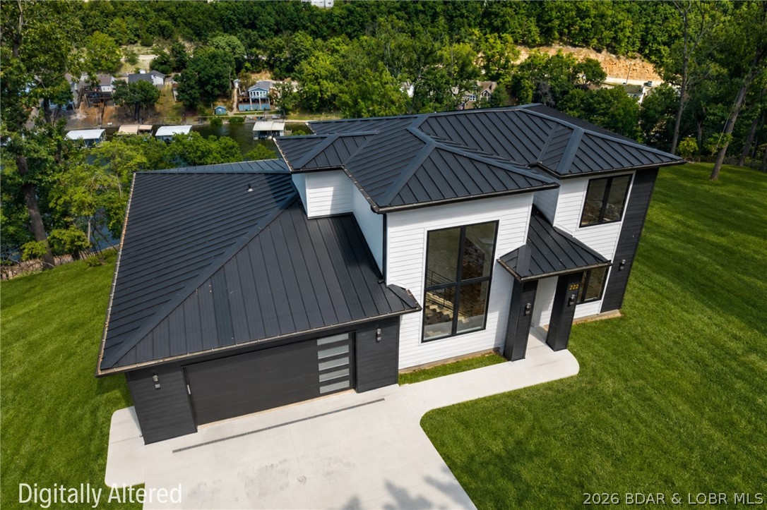 222 Red Bud Road Lake Ozark, MO 65049 - Photo 59 of 64 Aerial perspective highlighting the home's strikin