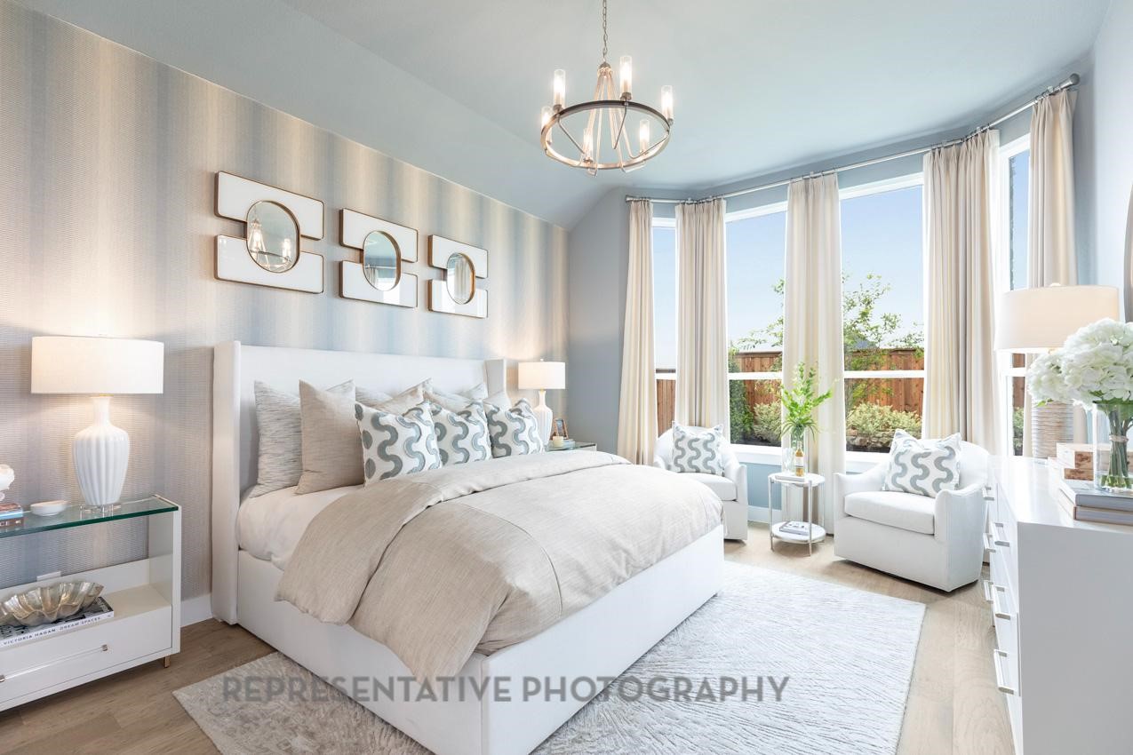22214 Mount Whitney Road Waller, TX 77484 - Photo 18 of 50 a bedroom with a large bed and a window