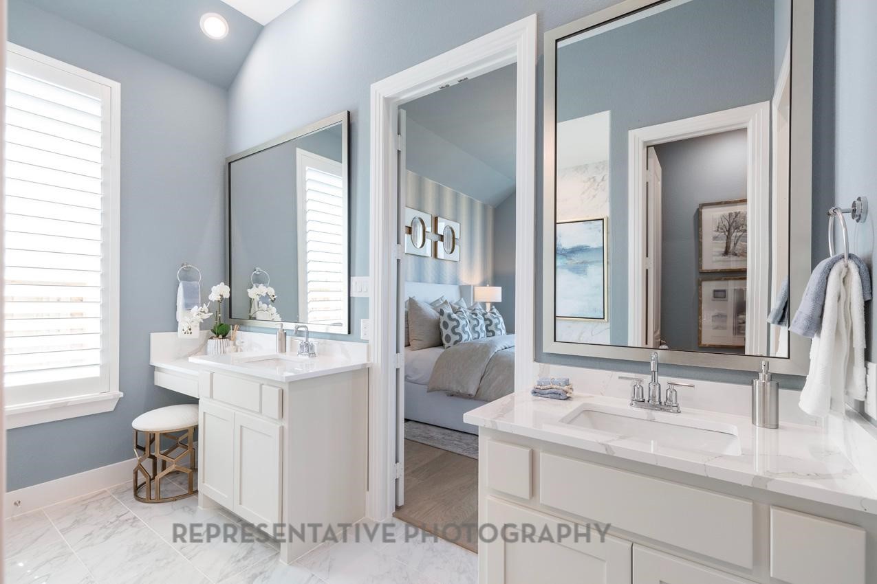 22214 Mount Whitney Road Waller, TX 77484 - Photo 27 of 50 a bathroom with a sink and a mirror