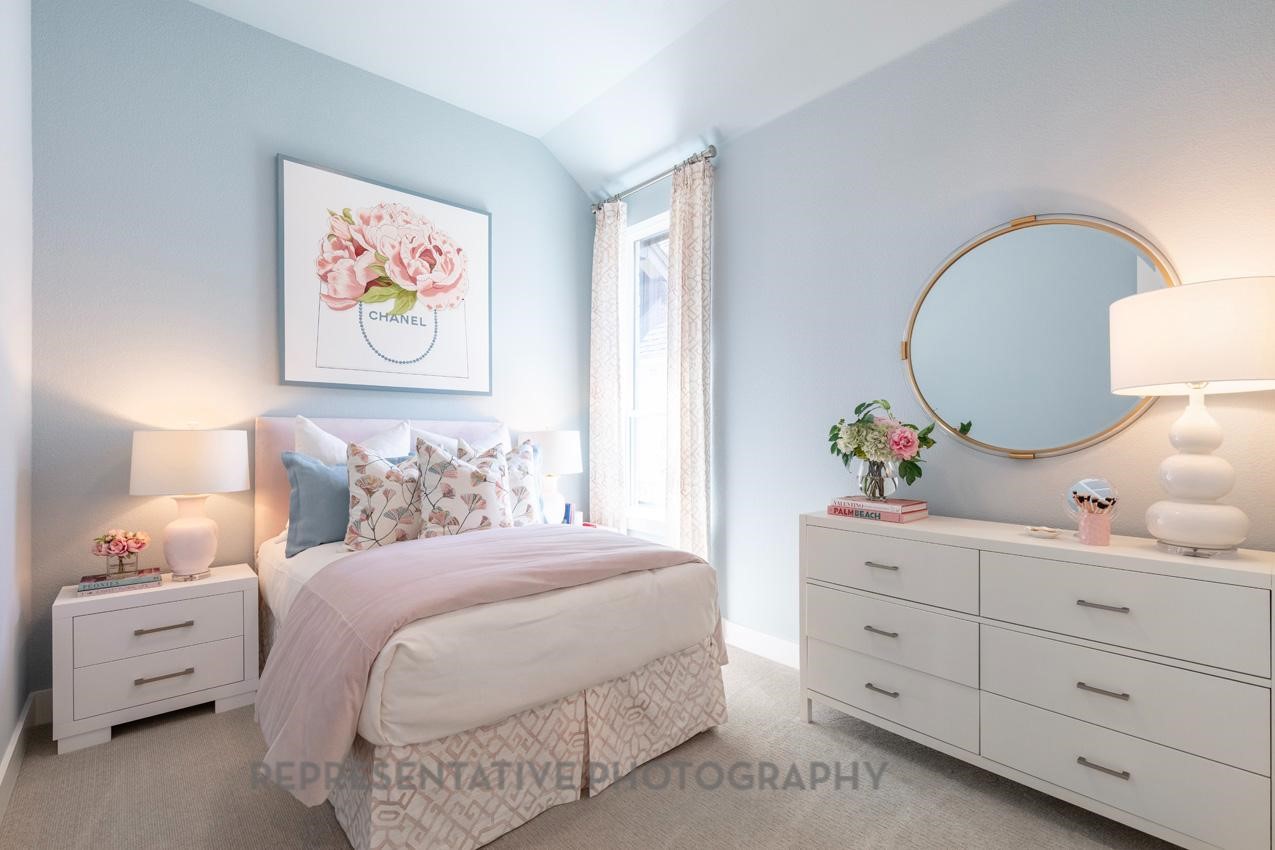 22214 Mount Whitney Road Waller, TX 77484 - Photo 37 of 50 a bedroom with a bed and a dresser