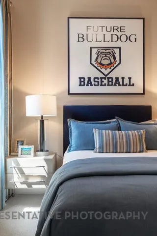 a dining room with furniture window and wooden floor