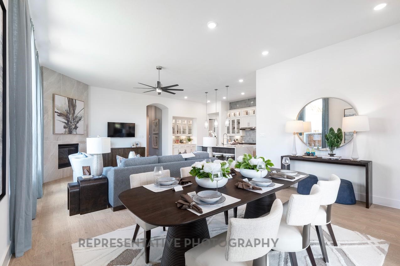 22214 Mount Whitney Road Waller, TX 77484 - Photo 44 of 50 a living room with lots of furniture and view of kitchen