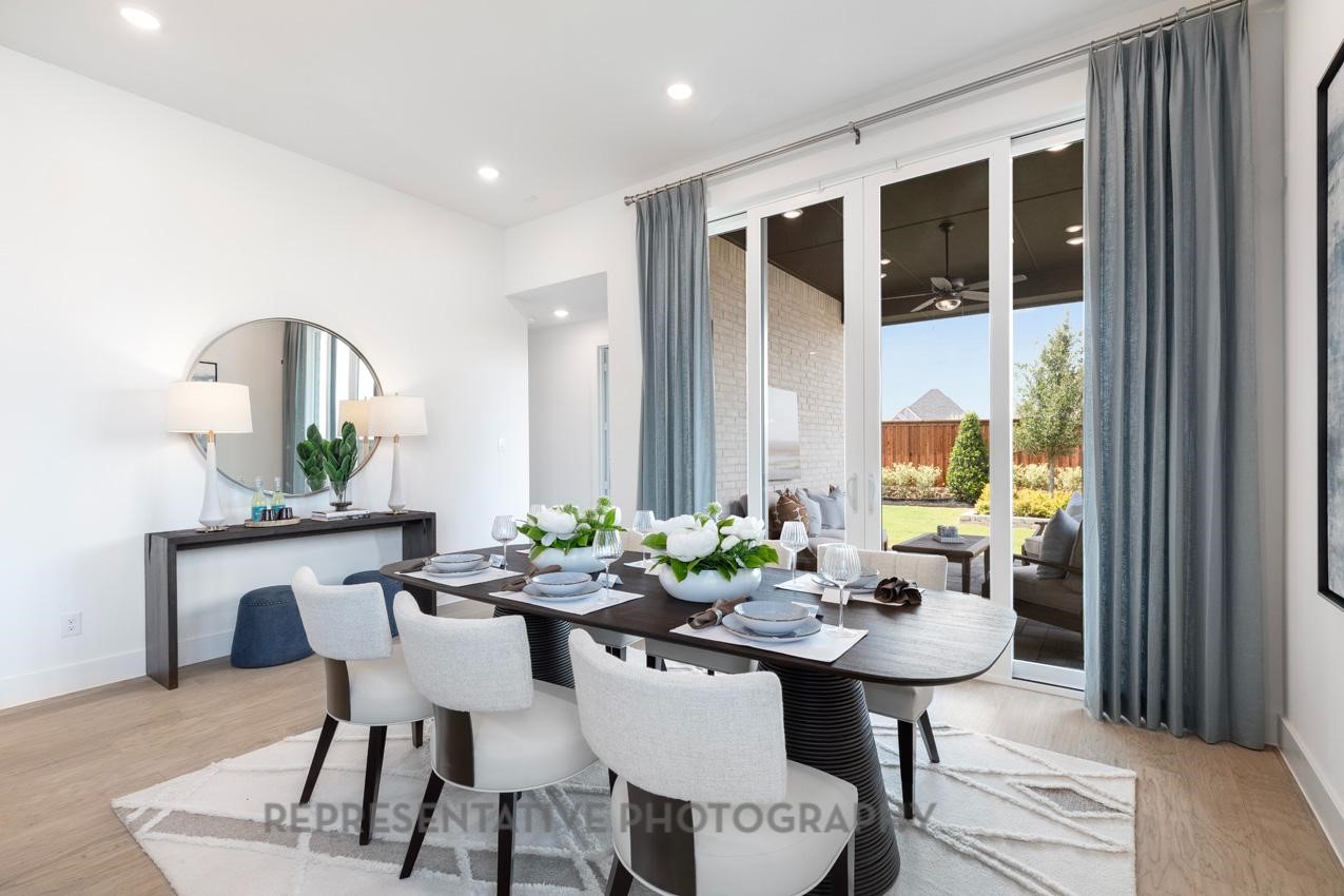 22214 Mount Whitney Road Waller, TX 77484 - Photo 45 of 50 a view of a dining room with furniture window and wooden floor