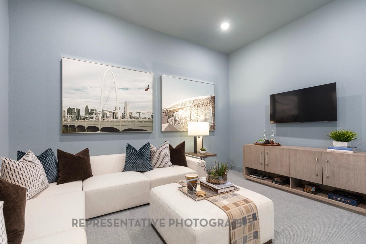 22214 Mount Whitney Road Waller, TX 77484 - Photo 48 of 50 a living room with furniture and a flat screen tv