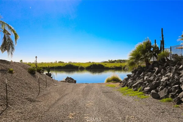 a view of a lake from a yard