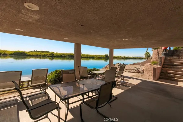 a view of a terrace with outdoor seating
