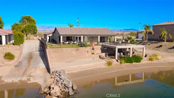 a view of a house with swimming pool