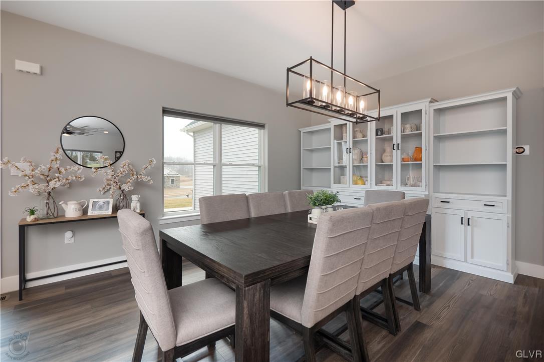785 Emerald Valley Lane Bangor, PA 18013 - Photo 4 of 28 a view of a dining room with furniture window and wooden floor