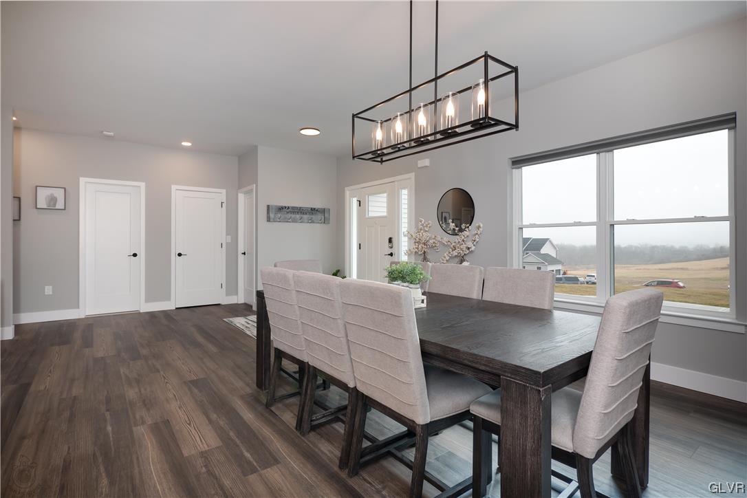 785 Emerald Valley Lane Bangor, PA 18013 - Photo 5 of 28 a view of a dining room with furniture window and wooden floor