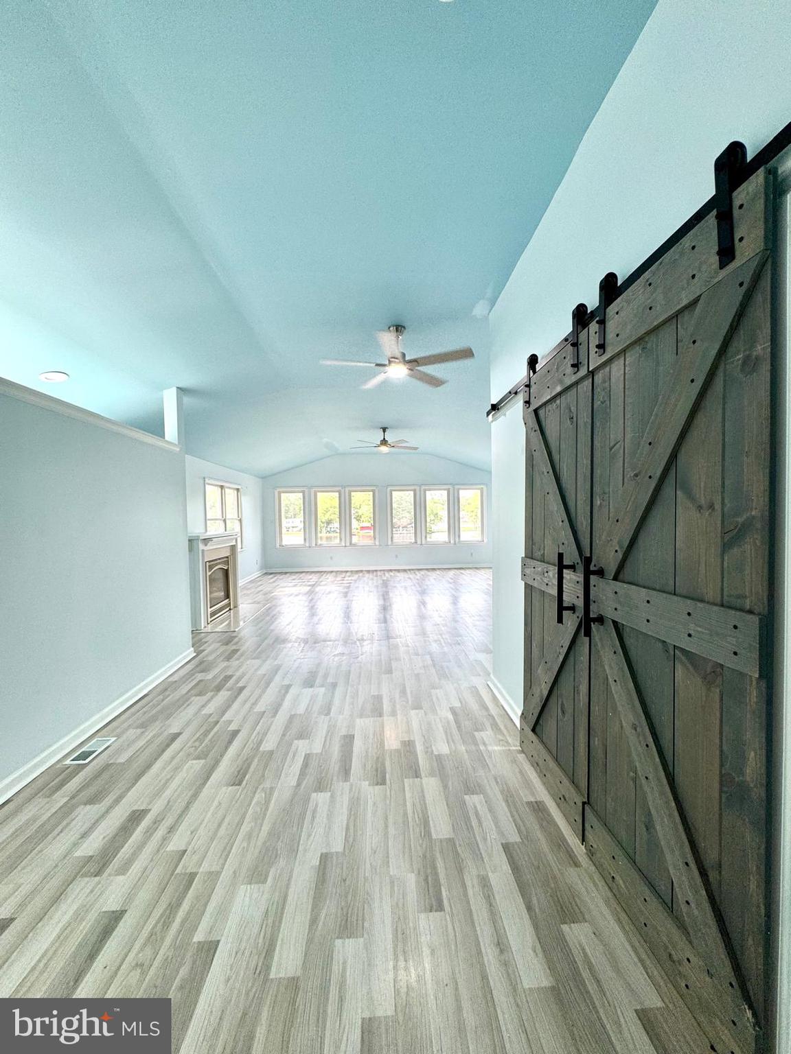 3614 Lakeside Drive Williamstown, NJ 08094 - Photo 15 of 40 a view of a room with wooden floor and a window