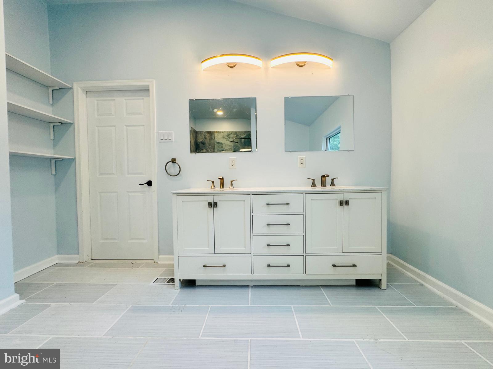 3614 Lakeside Drive Williamstown, NJ 08094 - Photo 24 of 40 a bathroom with a double vanity sink and mirror