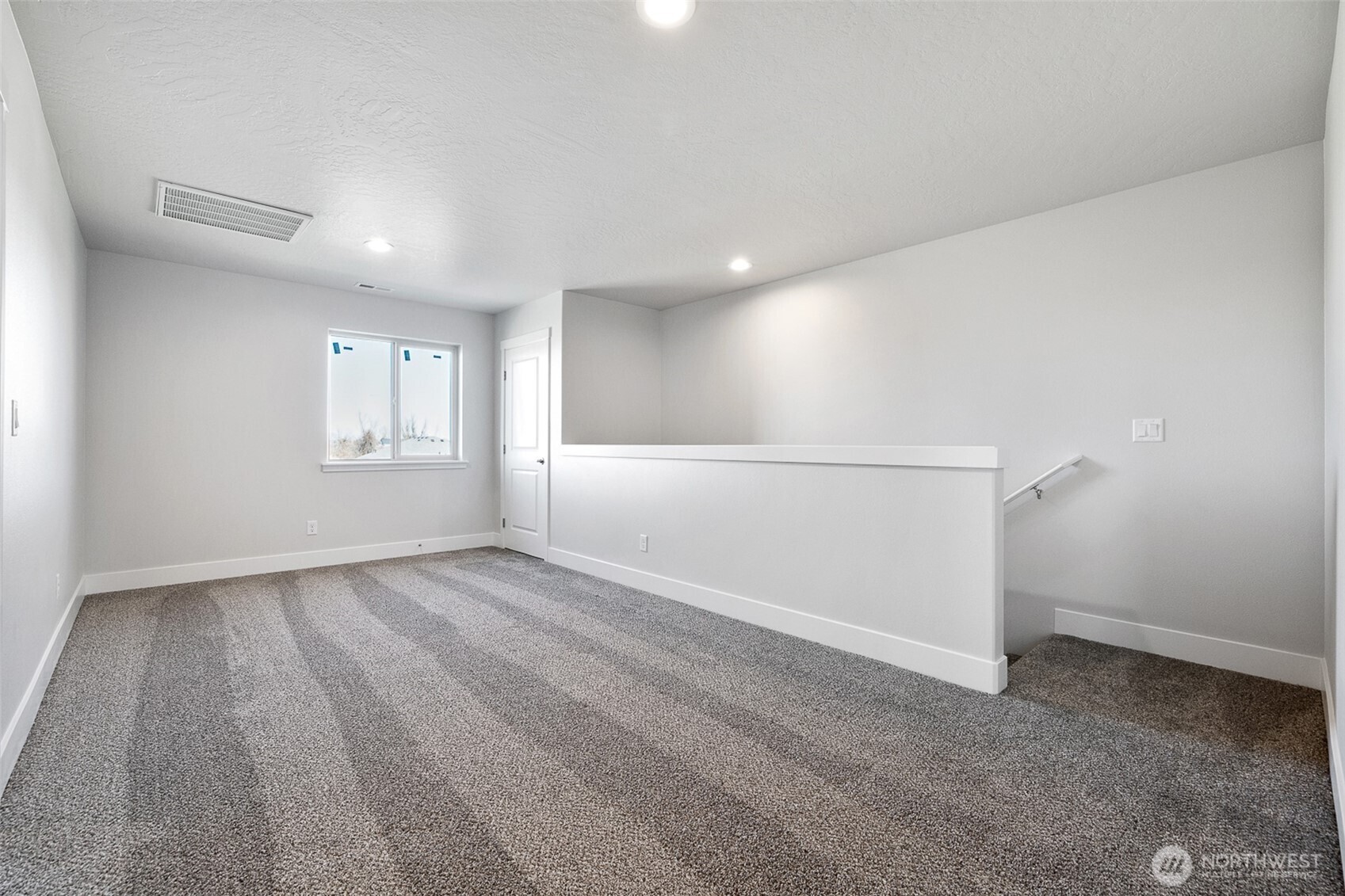 4247 Sandy Street Moses Lake, WA 98837 - Photo 14 of 24 a view of an empty room with a window