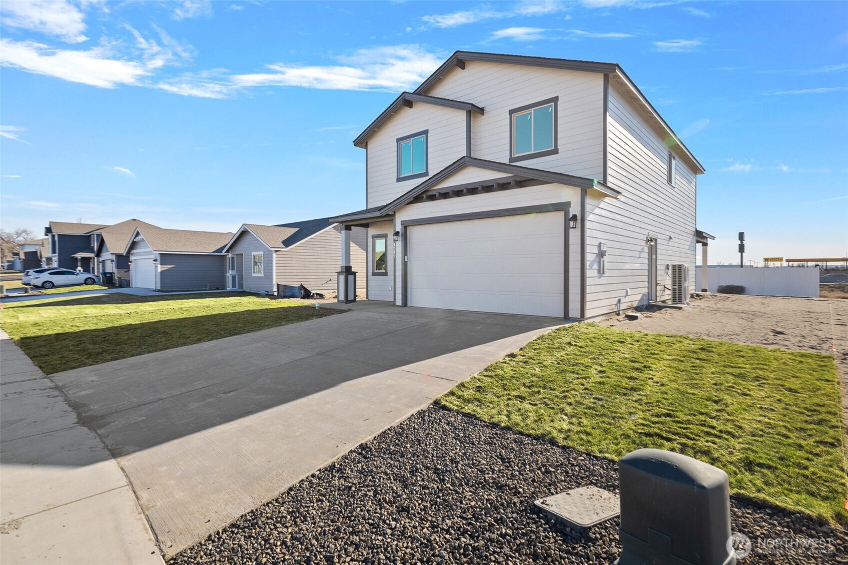 4247 Sandy Street Moses Lake, WA 98837 - Photo 2 of 24 a view of a house with a yard
