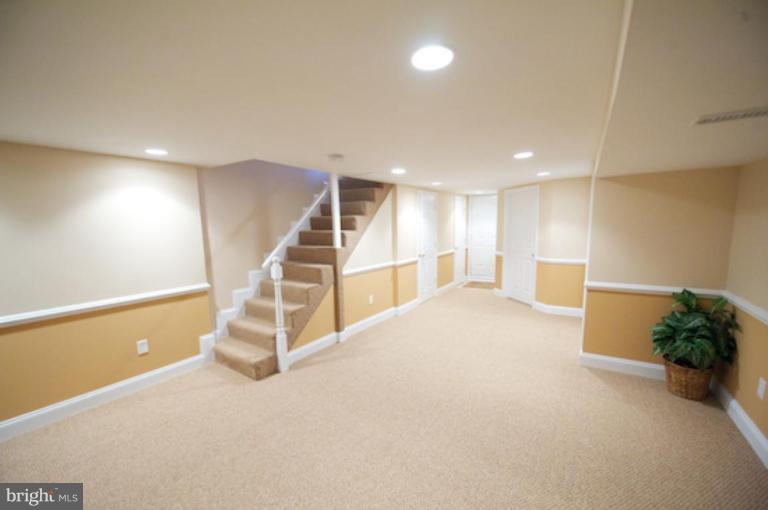 1968 Haselmere Road Dundalk, MD 21222 - Photo 11 of 16 a view of an empty room with stairs