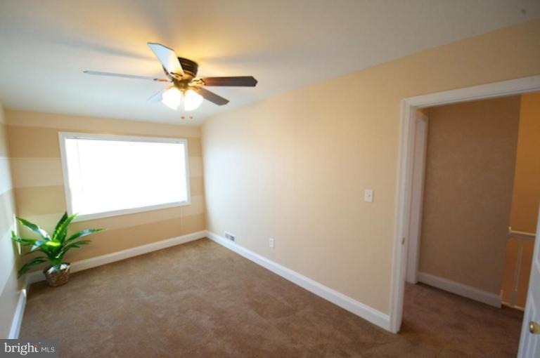 1968 Haselmere Road Dundalk, MD 21222 - Photo 14 of 16 a view of room with window and a ceiling fan