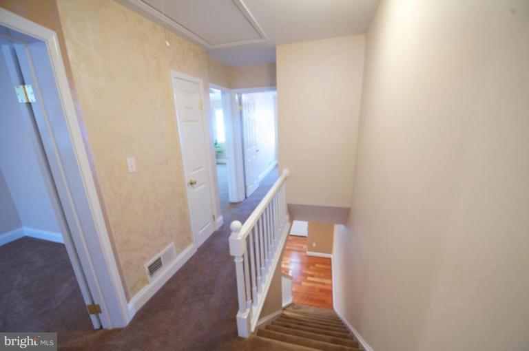 1968 Haselmere Road Dundalk, MD 21222 - Photo 6 of 16 a view of a hallway with stairs